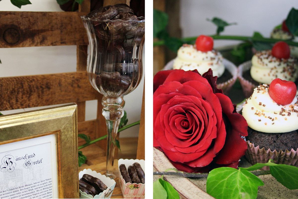 Rote Rosen und ein Glas mit verzaubertem Inhalt machen den Sweet Table zu einem Teil der märchenhaften Babyparty
